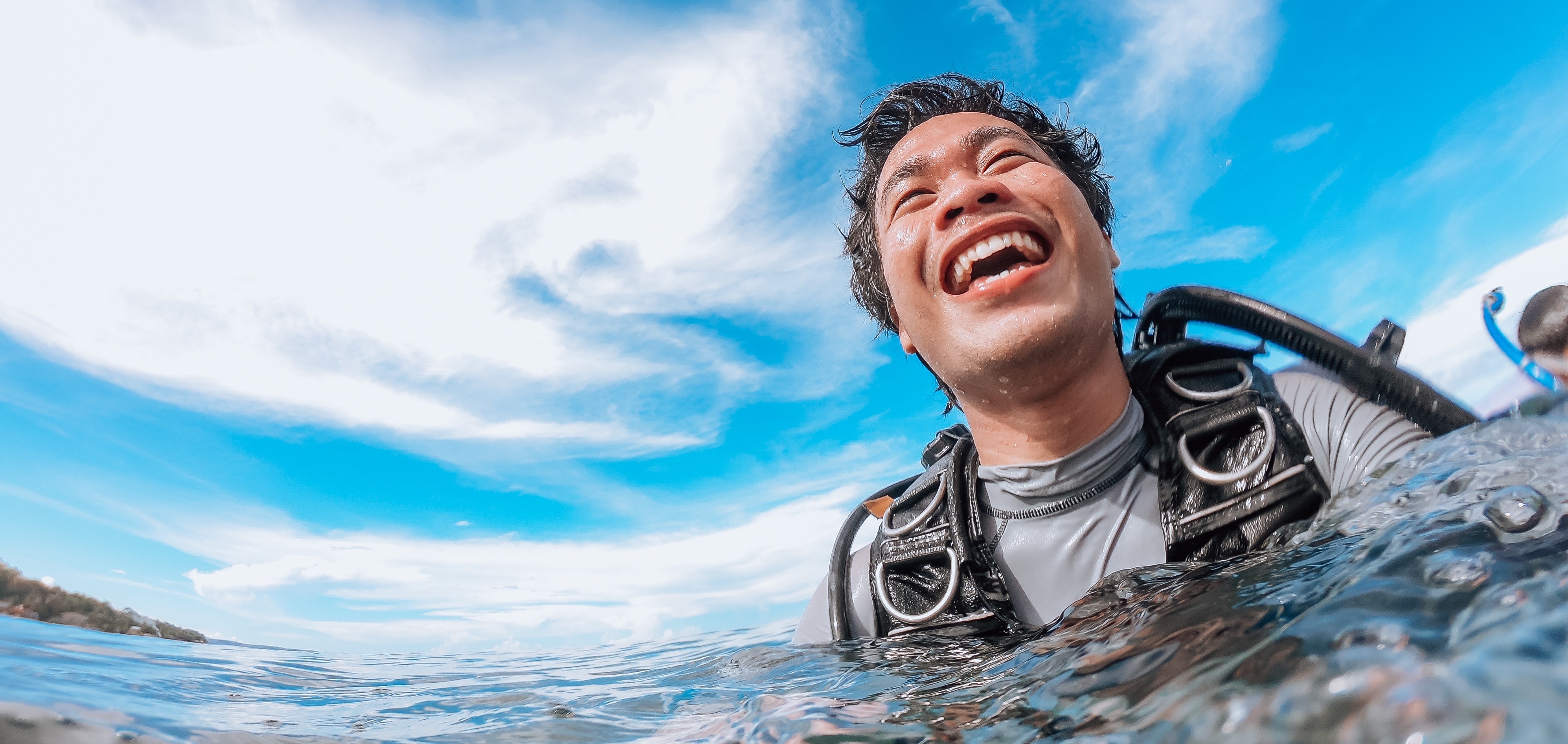 A new diver enjoying a safe dive with MDC on a sunny off the coast of Oahu